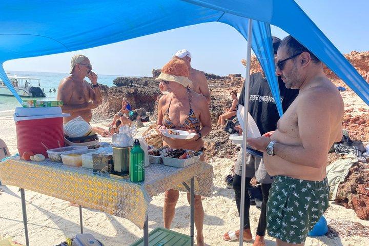 Shared Dimaniyat Islands Half Day Snorkeling from Al Mouj Marina