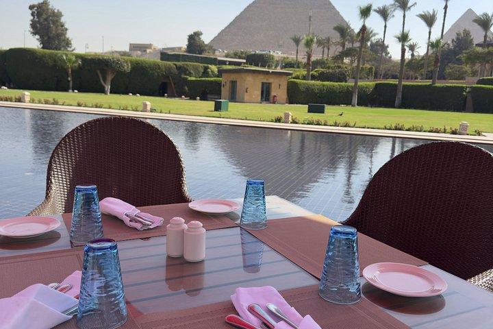 Private Half Day Giza Pyramids Tour with camel & Lunch