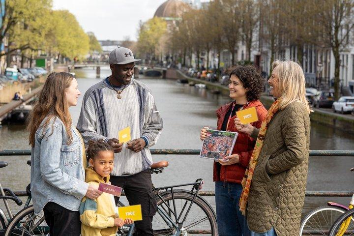 Tour privato a piedi della famiglia di Amsterdam con giochi e pancake