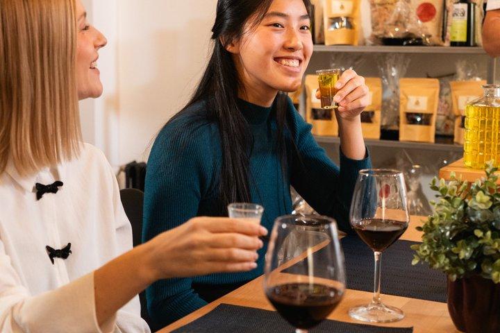 Aula de paella com vinho à vontade, churros e chocolate quente.