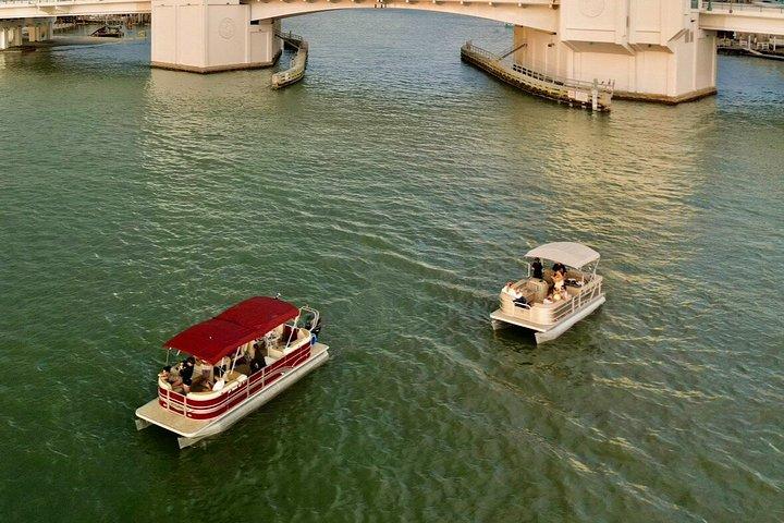 ジョンズ・パス経由で湾へ渡るアイランド&サンドバー・サンセットクルーズ