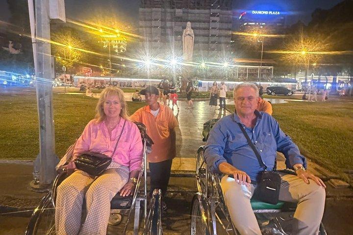 HCM City by Night: crociera con cena, ciclo e spettacolo di marionette sull'acqua