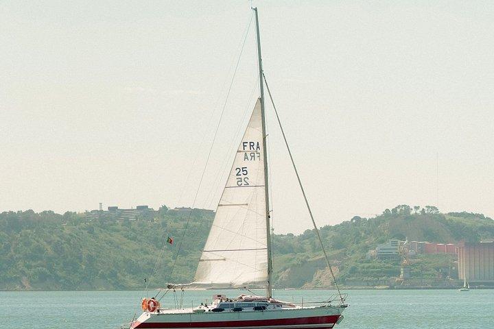 Discover Lisbon aboard a private sailboat in the Tejo