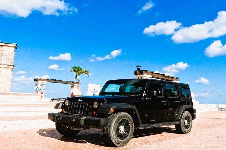 Cozumel by Jeep e snorkel by boat com almoço