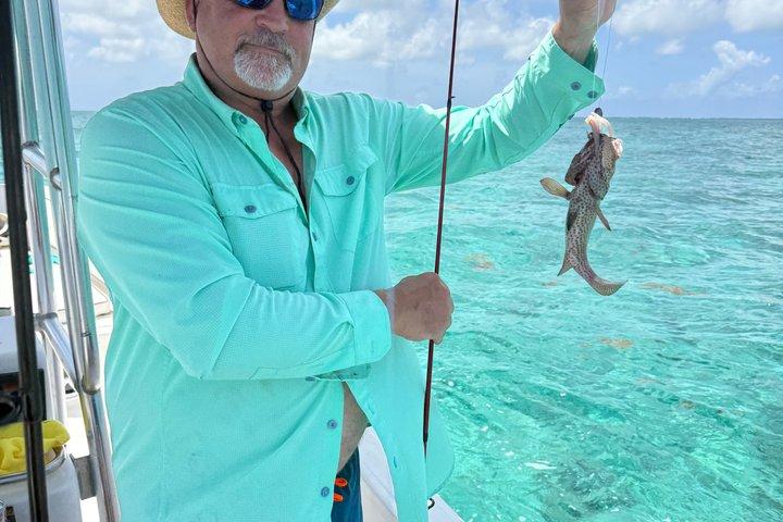 Pesca privata sulla barriera corallina e avventura di snorkeling