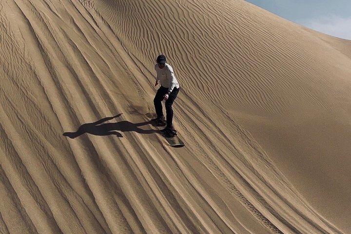 Adrenaline Fueled Quad Biking and Sandboarding in Essaouira