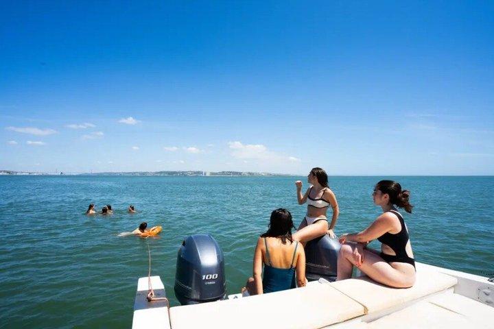 Lisbon 3-Hour Relaxed Motorboat Cruise with Swimming