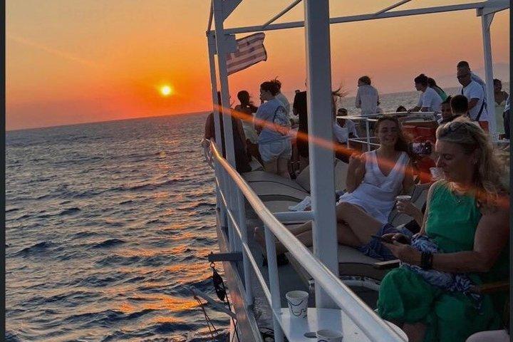 Rhodes Sunset Cruise: Swim, Greek Dinner, Wine & Live Music