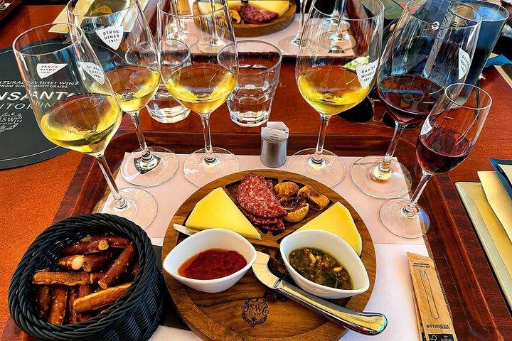 Sabores da excursão privada de comida e vinho ao pôr do sol em Santorini