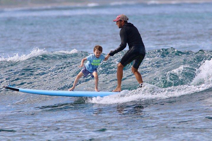 Tandem surflektion i Oahu