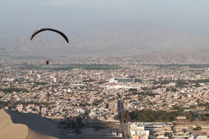 Paragliding over the Huacachina Desert