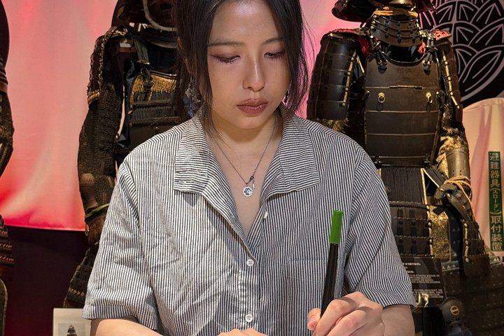 伝統の扇風機で書道アート体験