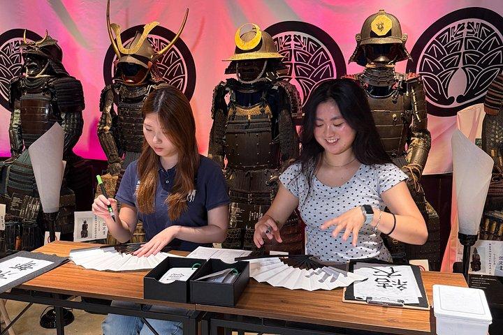 伝統の扇風機で書道アート体験