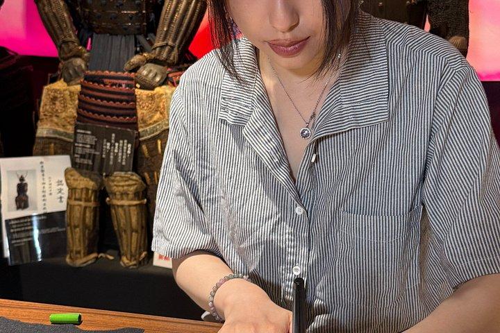 伝統の扇風機で書道アート体験