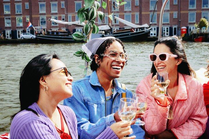 Small Shared Canal Cruise Local Captain and Hidden Gems Amsterdam