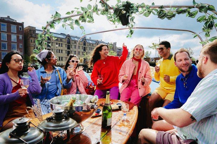 Small Shared Canal Cruise Local Captain and Hidden Gems Amsterdam