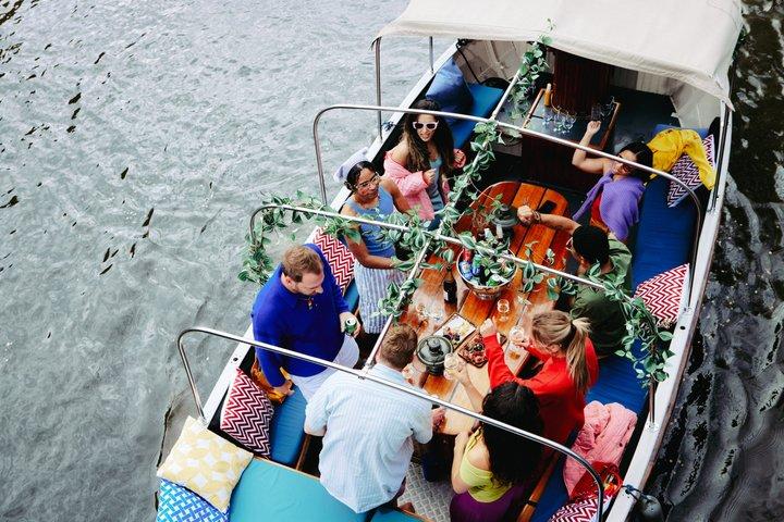 Small Shared Canal Cruise Local Captain and Hidden Gems Amsterdam
