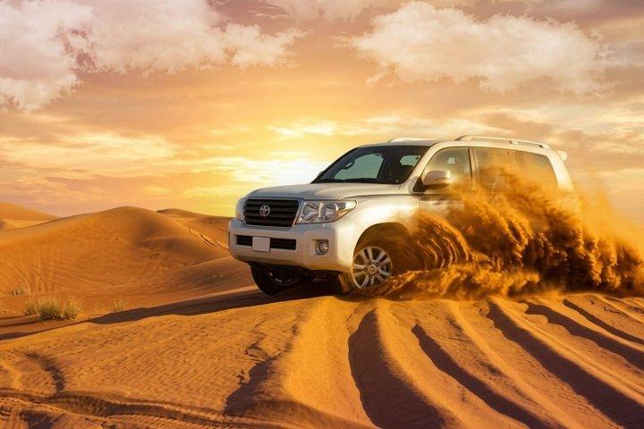 Dubai Red Dune Safari 4X4 Pickup Camel ride and BBQ Dinner