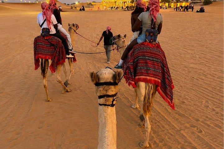 Dubai Red Dune Safari 4X4 Pickup Camel ride and BBQ Dinner
