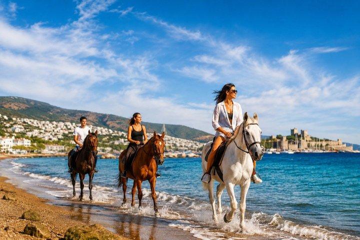 Paseo a caballo en la playa con opción de puesta de sol