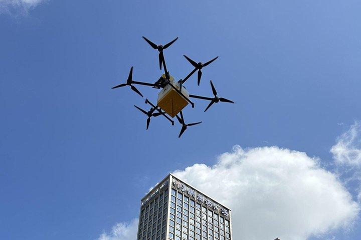 Shenzhen : Toekomstige Tech Tour Drone Delivery, robot en koffie