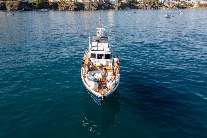 Benalmadena dolphin watching on snorkel boat and drinks