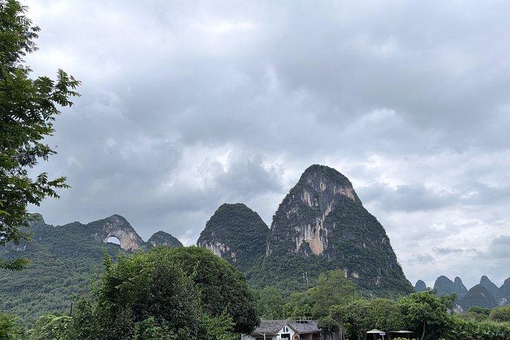 麗江の竹ボートとスクーターで玉龍川を巡る日帰りツアー