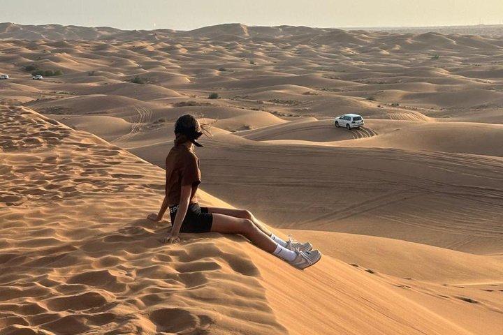 Dubai Desert Safari with BBQ Dinner Camel Ride and Hotel Pickup