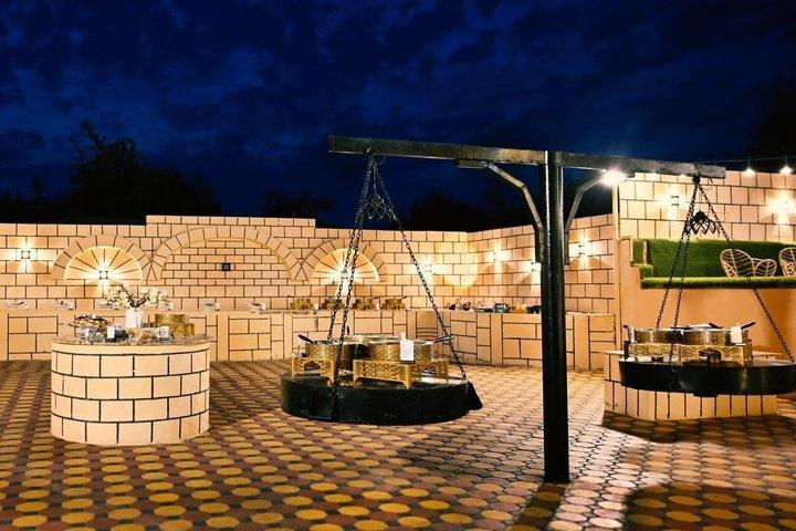 Private Evening Desert Safari Premium Camp: BBQ Camel & Sandboard