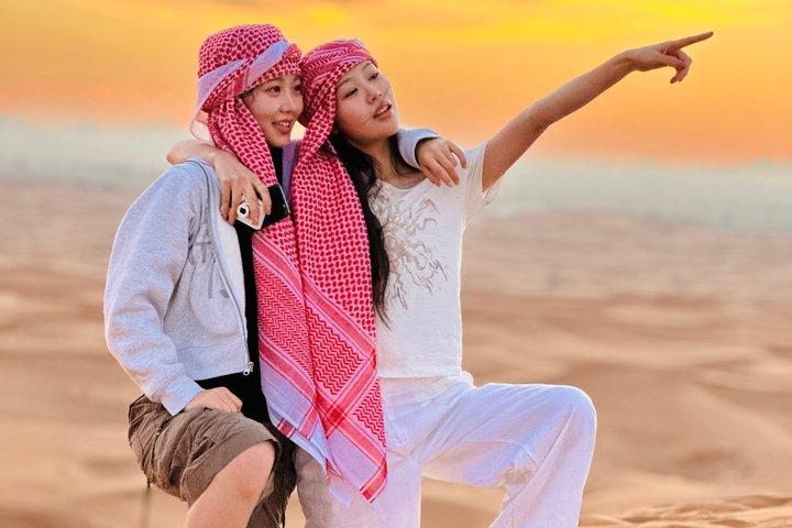 Dubai Sunrise Desert Safari, Sandboarding & Camel Ride