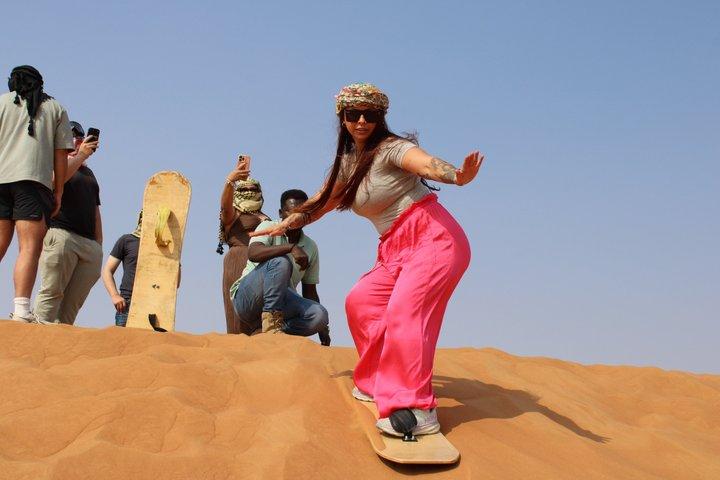 Dubai Sunrise Desert Safari, Sandboarding & Camel Ride