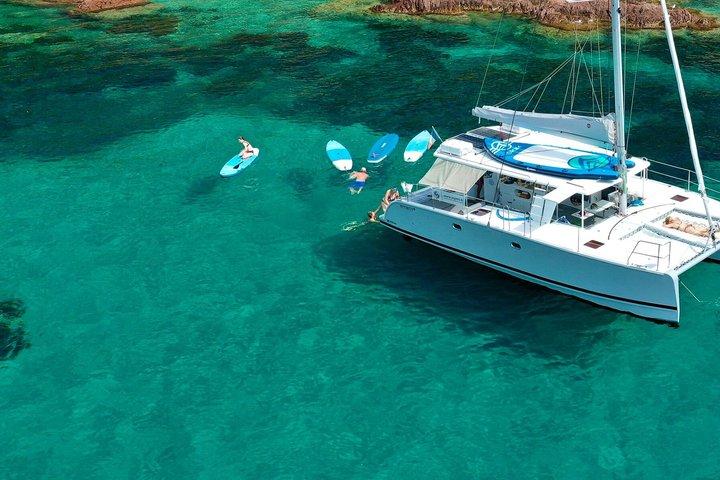 Half-day catamaran tour with paddleboarding