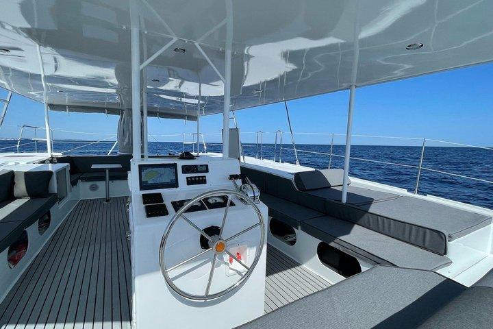 Half-day catamaran tour with paddleboarding