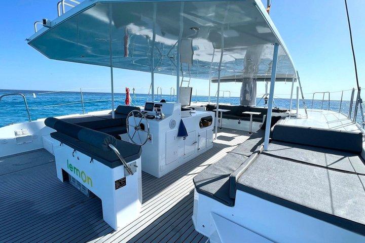 Half-day catamaran tour with paddleboarding