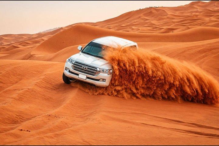 Dubai Desert Safari with Dune Bashing Camel Ride BBQ and Shows