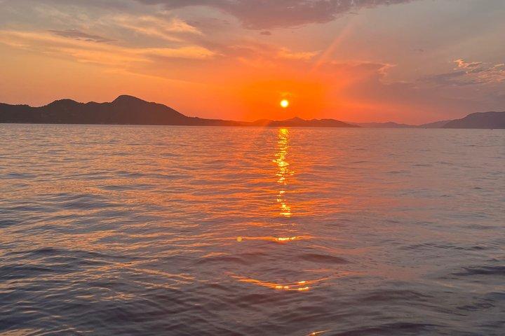Sunset & Swim Blue/Green Caves Speedboat Tour