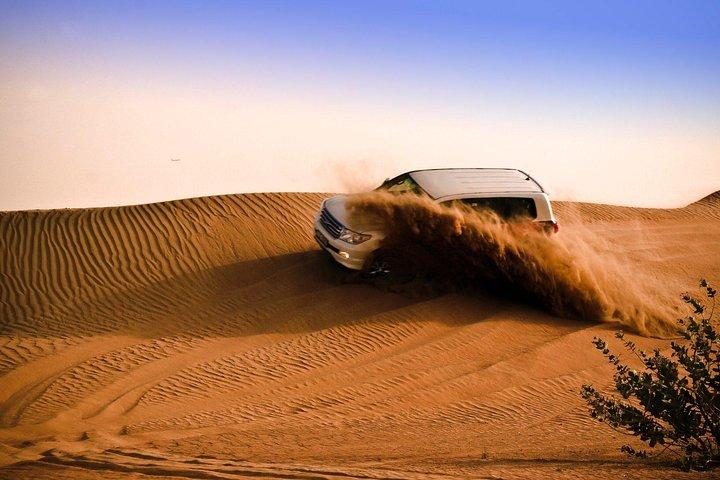 Dubai Desert Safari Dune Bashing Private Basis with sandboarding