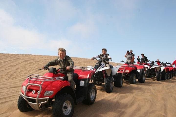 Red Dune Safari with Quad Bike Sand Boarding and Camel Ride