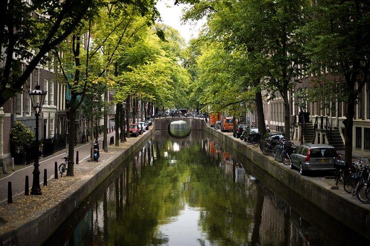 Excursion privée d'une journée de Rotterdam à Amsterdam avec un local
