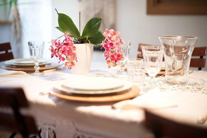 Dining Experience at a local's Home in Isola Rizza with Show Cooking