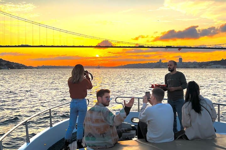 Bosphorus Sunset or Daytime Yacht Cruise with Snacks & Live Guide