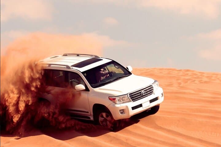 Dubai Quad Bike Safari: 4x4 Red Dune Bashing & BBQ Thrill