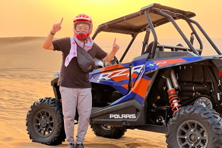 Sunset Safari with BBQ Dune Drive Camel Ride & Dune Buggy option