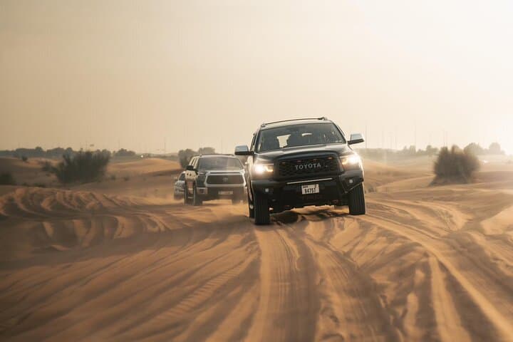 Dubai Desert Safari with Camel Ride, Sand surf, & BBQ Dinner