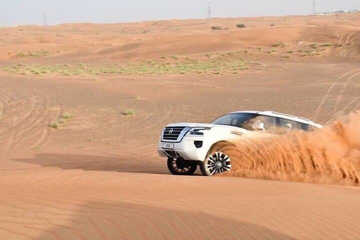 Private Morning Desert Safari with Camel Ride & Sandboarding