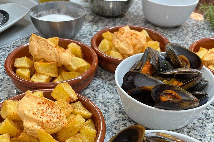 Seafood Paella cooking class Sangria workshop & Local Market