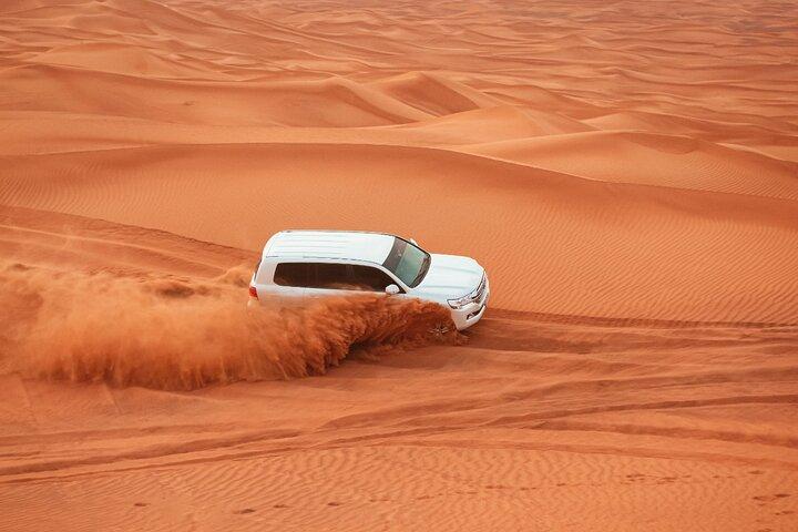 Desert Safari Camel Ride BBQ Dinner Sunset View Ras al Khaimah