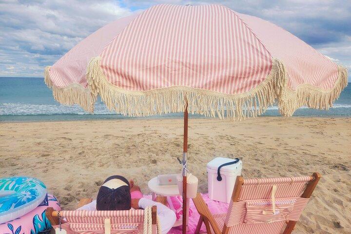 West Palm Beach-dag: Paraplu, stoelen, Yeti, JBL-luidspreker, handdoeken+