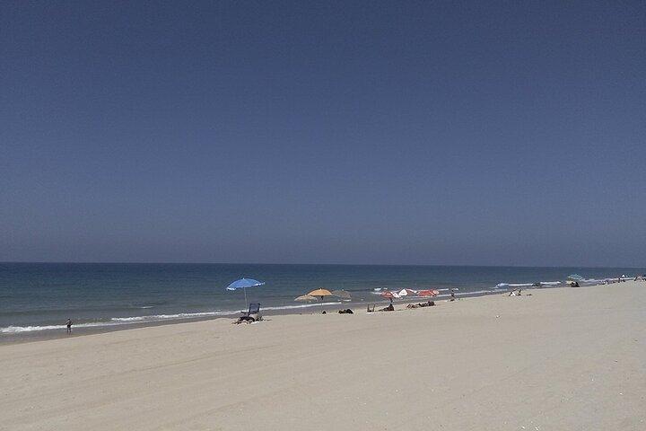 Faro stads- en strandtour op elektrische tuktuks