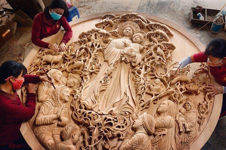 ホイアン木彫り: マスターアルチザンでアートウッドを作成